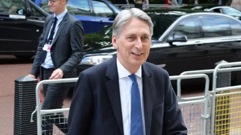 PA Philip Hammond