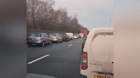 Matt Bill Queueing traffic on a dual carriageway road