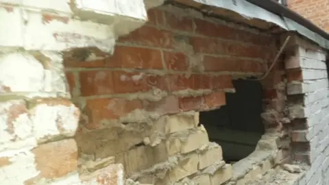 BBC Damage to shop wall