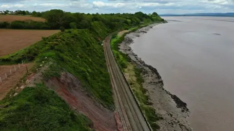 Network Rail Drone shot of the railway running alongside the Severn Estuary
