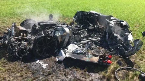 Twitter The car is a mangled mess