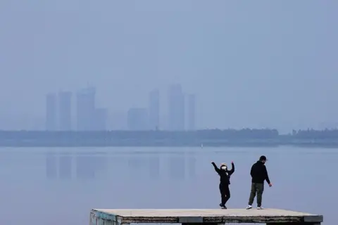 Aly Song / Reuters People in Wuhan