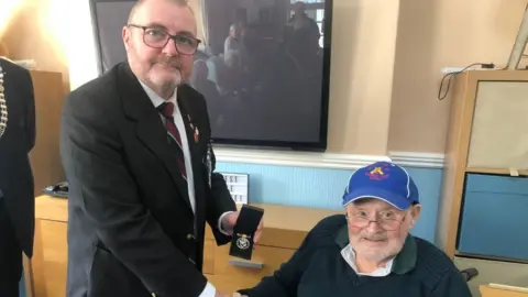 Phil Connell / BBC Picture of the medal presentation