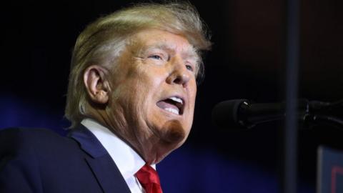 Donald Trump recorded saying he kept classified file after leaving