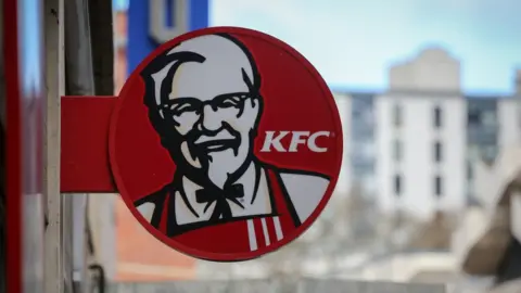 Getty Images The logo of KFC displayed outside of a branch closed due to a chicken shortage