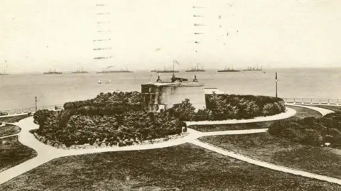 Kevin Gordon The Wish Tower in Eastbourne during the late 1800s. The black and white image shows the tower which is near the sea.