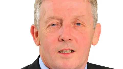 A headshot of former leader of Tameside Council Gerald Cooney 