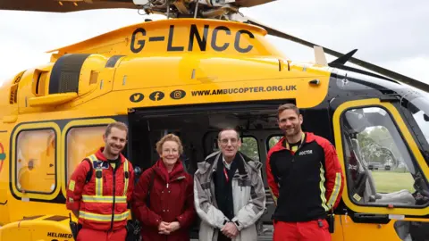  Lincs & Notts Air Ambulance Allan Gardner and air ambulance