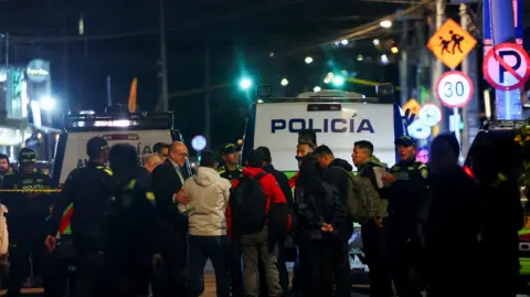 Reuters Police officers guard the area where Colombian Senator Miguel Uribe Turbay of the opposition Democratic Center party, was shot during a campaign event, in Bogota, Colombia, June 7