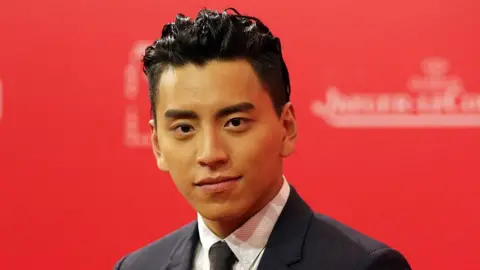 Darren Wang arrives for the red carpet of the 19th Shanghai International Film Festival at Shanghai Grand Theatre on June 11, 2016 