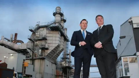 Stewart Attwood Superglass chief executive Ken Munro with Economy Secretary Keith Brown