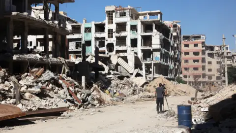 BBC/Jeremy Bowen Eastern Ghouta, outside the Syrian capital Damascus, June 2018 - BBC cameraman Nik Millard pictured