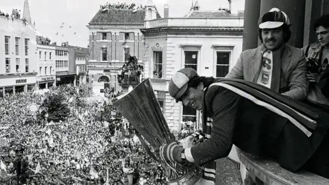 Archant Suffolk Paul Mariner holding the Uefa Cup in Ipswich town centre in 1981