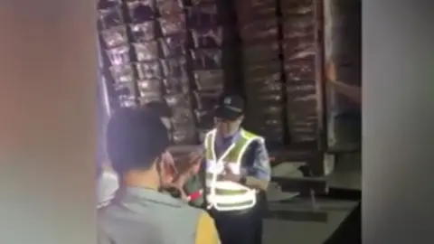 Beijing News/Weibo The boxes of animals can be seen inside the truck