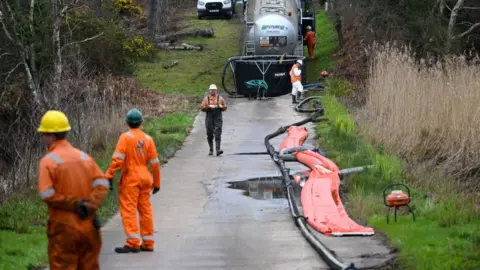 Finbarr Webster/Getty Images Clean up at Poole Harbour