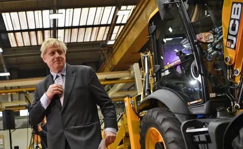 EPA Boris Johnson at JCB's headquarters in Staffordshire