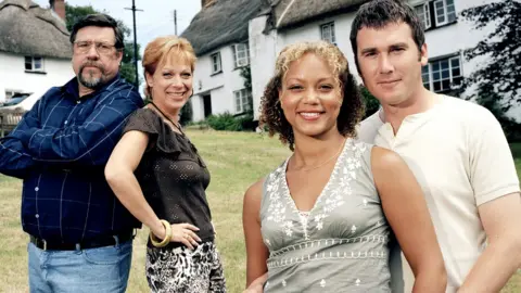 Denise Welch in 2004's Down to Earth with Ricky Tomlinson, Angela Griffin and Ian Kelsey