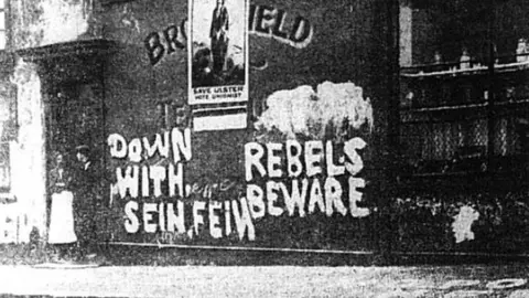 Belfast Telegraph Graffiti urging unionists to vote against Sinn Féin