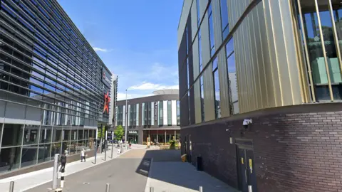 Google Google Streetview image looking towards Southwater Square in Telford, with a Cineworld cinema on the left and Premier Inn directly ahead