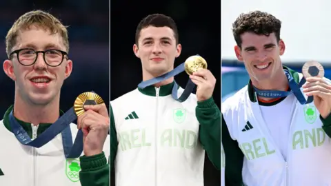 Getty Images Daniel Wiffen, Ryhs McClenaghan, Philip Doyle all holding their Olympic medals