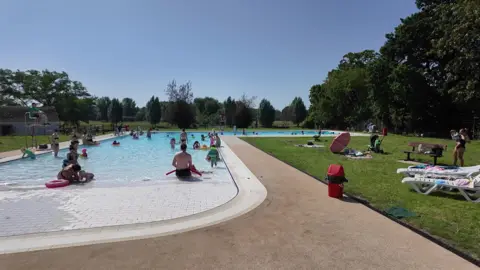 A photo of people enjoying themselves at Abbey Meadows Outdoor Pool in Abingdon