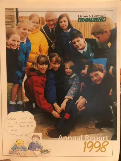 Jenny Pengelly The front cover of Devon and Cornwall Housing's annual report showing the children and the time capsule 