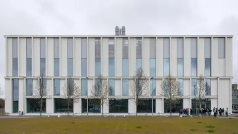 Broad daylight From the outside, the science and teaching hub looks like a white box, four storeys high with lots of windows 