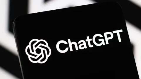 The black and white ChatGPT logo on a phone screen