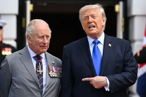 Getty Images King Charles and U.S. President Donald Trump pose during a farewell ceremony at the White House on day four of the State Visit of King Charles III and Queen Camilla to the United States of America, on April 30, 2026 in Washington, DC. 