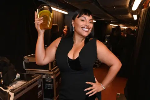 Getty Images Paloma Elsesser, winner of the Model of the Year Award, poses backstage at The Fashion Awards 2023 presented by Pandora at The Royal Albert Hall on December 4, 2023 in London, England.