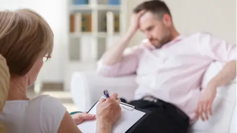 Getty Images Psychiatrist and patient