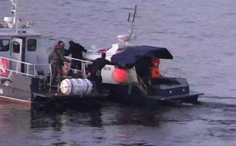 Image of the buoys being removed
