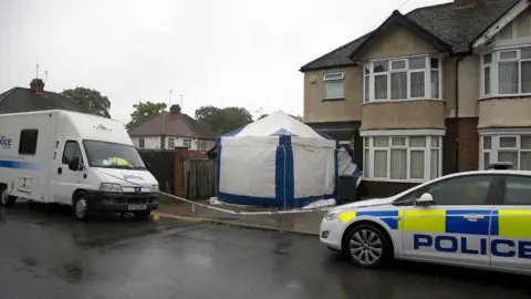 sbna Police forensics tent and cordon