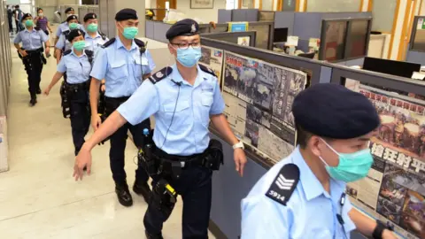 Getty Images Around 200 police officers raided the paper's office