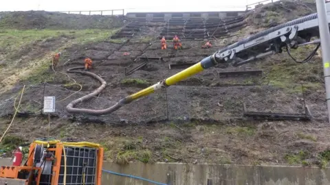 BCP Council Engineers removing 1970s cliff retention materials