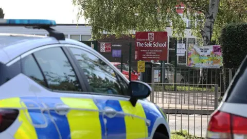 South Beds News Agency A police car outside the Sele school