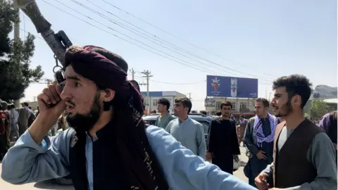 Reuters Taliban fighters at the airport