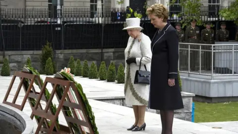 Pool/Getty Images Irish President Mary McAleese and Queen Elizabeth II lay a wreath at Dublin Memorial Garden in May 2011