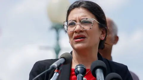 Getty Images Rep. Rashida Tlaib (R-MI) speaks at a press conference calling for the expansion of the Supreme Court on July 18, 2022 in Washington, DC.