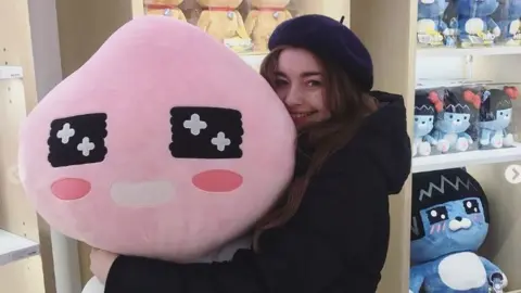 Stephanie Fairfield/Instagram Stephanie hugging a teddy