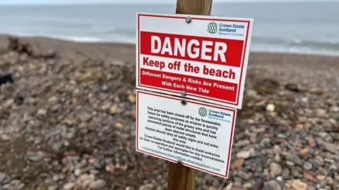 sign on a beach