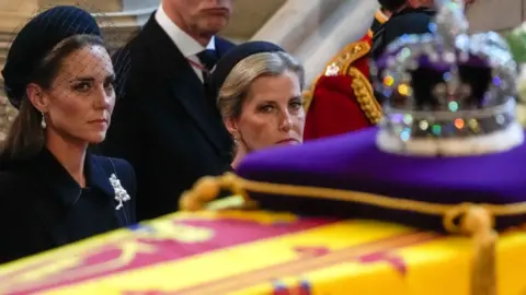 Getty Images The Princess of Wales and Sophie, Countess of Wessex, look at the Queen's coffin