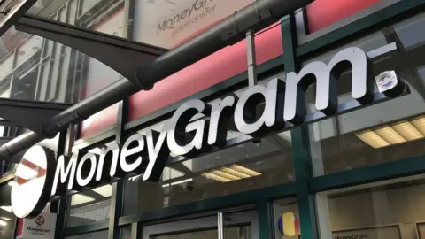 Reuters Moneygram sign