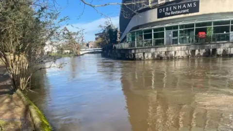 A flooded street in the Millmead area of Guildford in March 2024.