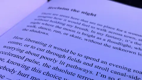 Jon Wright/BBC Close-up image of text on a page of a book; the main line visible says, "How liberating it would be to spend an evening..." 