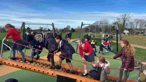 bbc Children on climbing frame