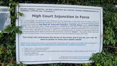 The High Court Injunction sign at Valero's depot in Plymouth