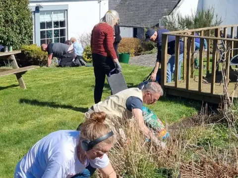 MCHP People at work gardening.
