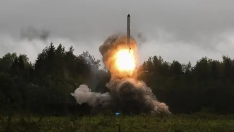 EPA A Russian missile is fired during military exercises