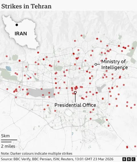 A detailed street‑map of Tehran showing locations marked with red dots indicating strike sites. In the northern part of the city, one marker sits at the Ministry of Intelligence. Farther south, a cluster of markers indicates multiple strikes near the Presidential Office. To the east, there is another individual strike marker. An inset map in the upper left indicates that Tehran sits in the north of Iran.